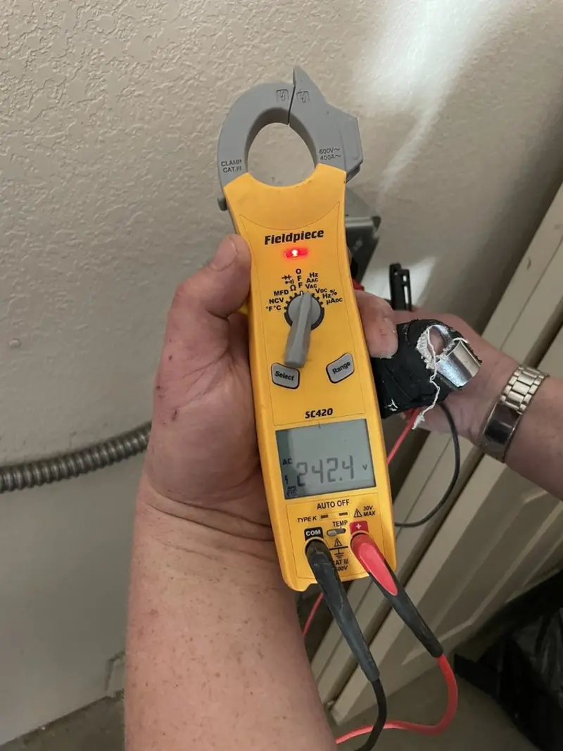 Voltage testing with clamp meter during Circuit Breaker Repair in Pleasant Hills